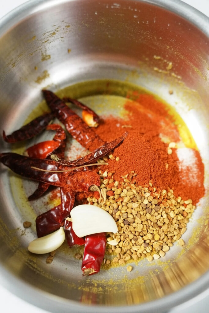 red chili powder, turmeric and fennel seeds